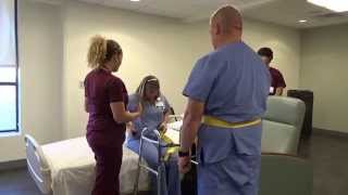 Physical Therapy Transfer Training  How To Transfer From Wheelchair To Bed [upl. by Acinorahs]